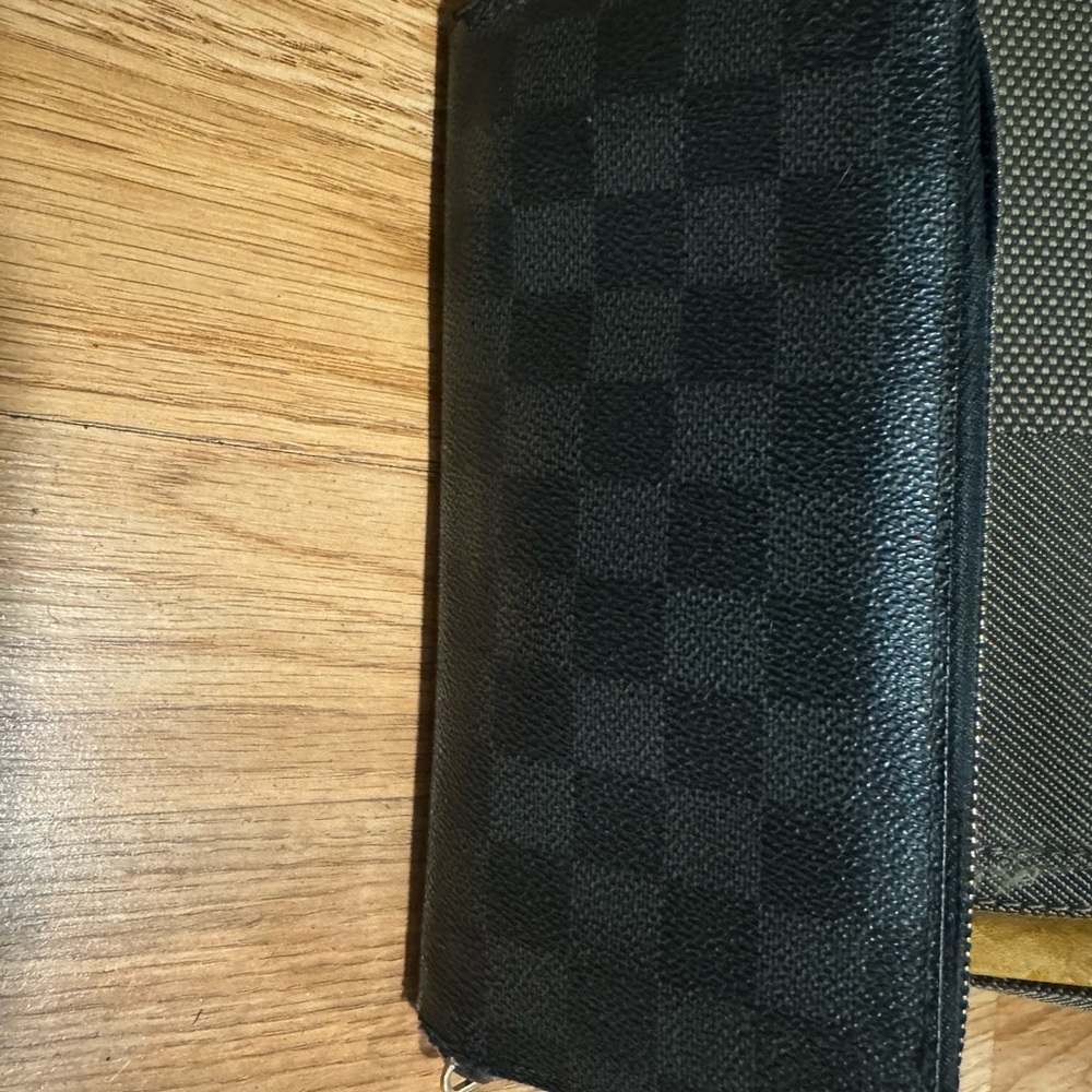 Louis Vuitton Damier black zip around wallet